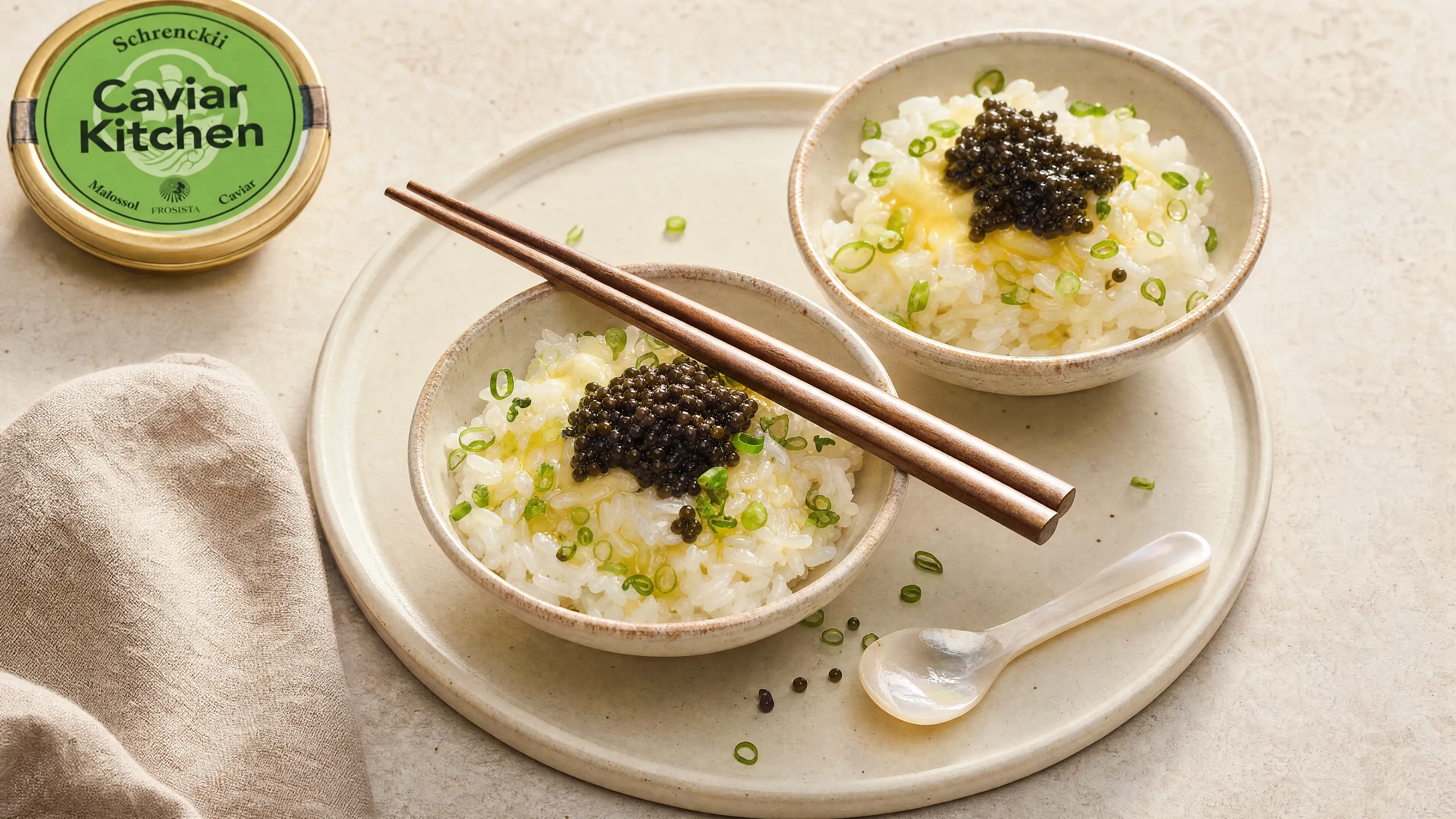 Two white bowls of steamed rice with melted butter, green onion, and a spoonful of dark Schrenckii caviar on top